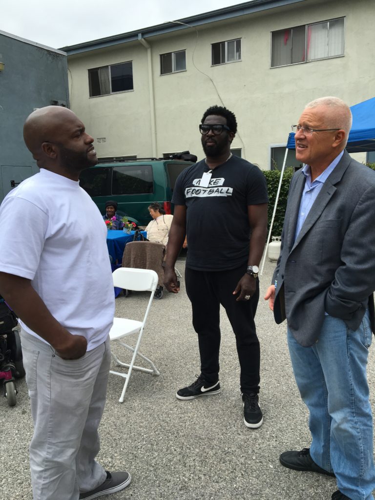 Councilmember Mike Bonin speaks with some event attendees.